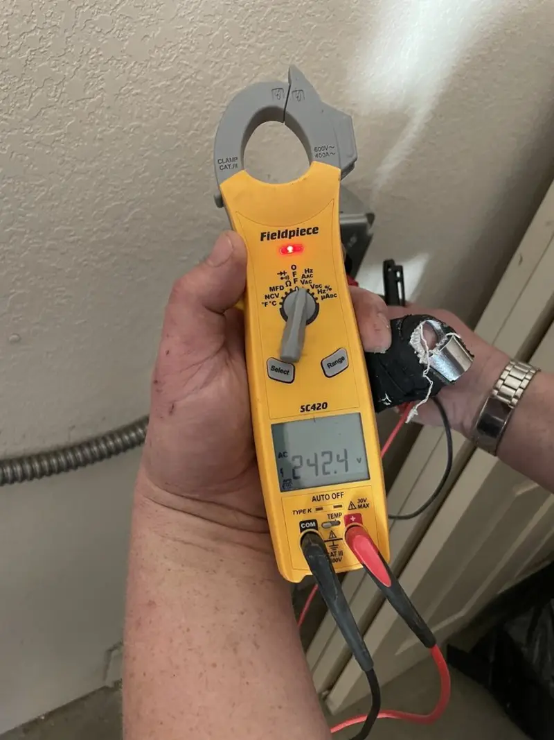 Voltage testing with clamp meter during Generator Installation in Corona